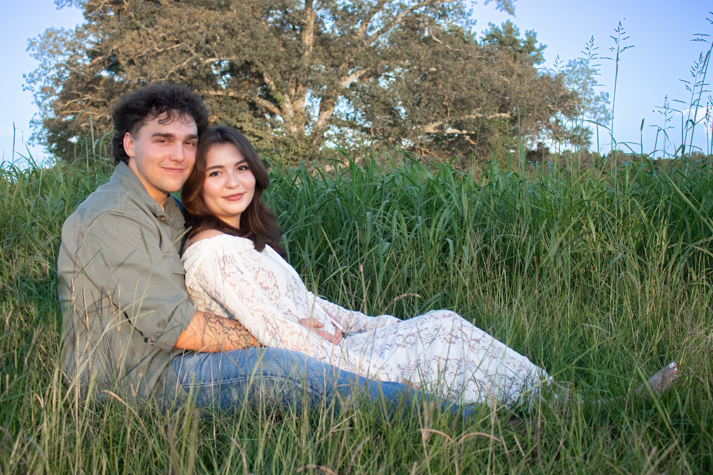 Expecting couple sharing a quiet moment outdoors